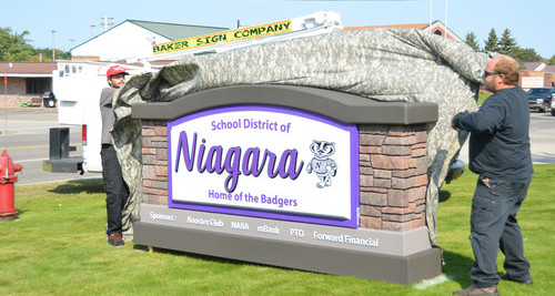 Unveiling new school sign