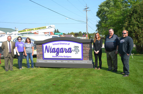 Unveiling new school sign